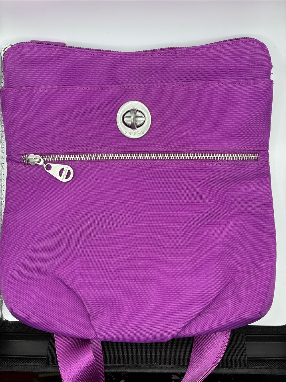 Baggallini Hanover Crossbody Bag in Magenta with Turn Lock Closure